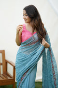 Blue Georgette Saree with Pink Blouse Piece