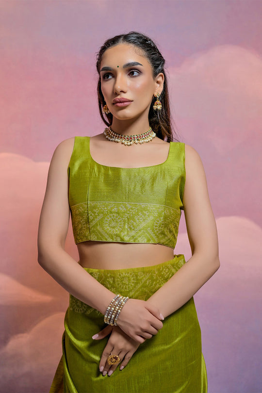 Green Silk Blend Saree With Blouse Piece