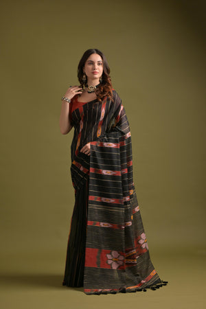 Black Premium Soft Ikkat Cotton Saree With Traditional Weaving Pattern On Pallu And All Over Weaving Pattern And Fancy Tassels With Running Blouse Piece