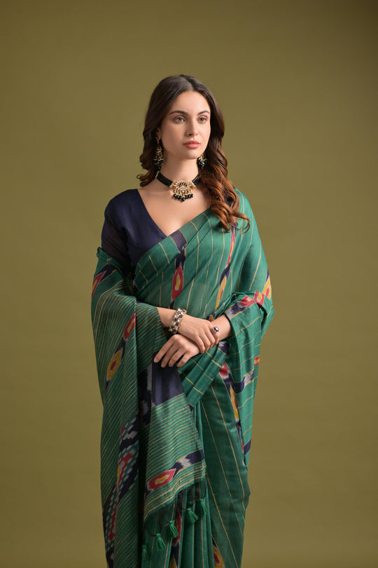 Green Premium Soft Ikkat Cotton Saree With Traditional Weaving Pattern On Pallu And All Over Weaving Pattern And Fancy Tassels With Running Blouse Piece
