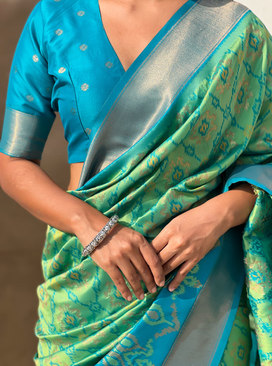 Green Banarasi Silk Blend Saree With Blouse Piece