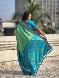 Green Banarasi Silk Blend Saree With Blouse Piece