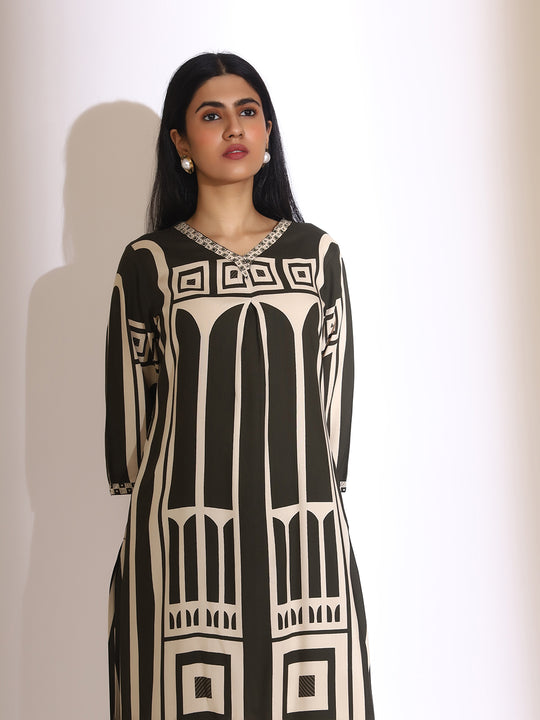 Geometric Quirky Printed A- Line Kurta & Trouser with Embroidered Hem