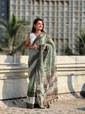 Green Banarasi Silk Blend Saree With Blouse Piece