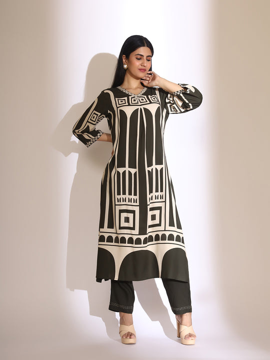 Geometric Quirky Printed A- Line Kurta & Trouser with Embroidered Hem
