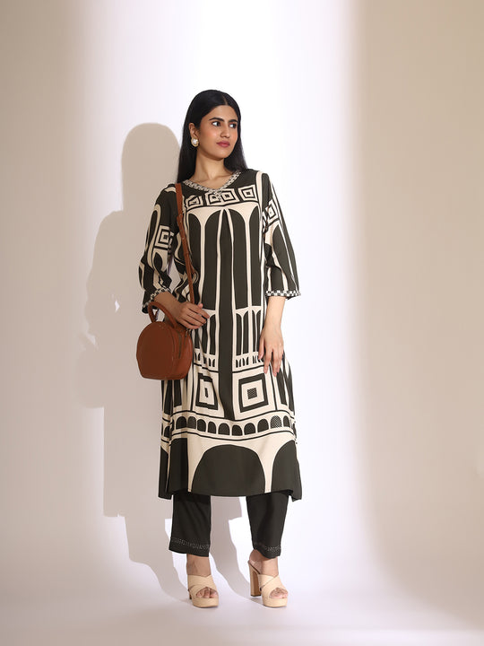 Geometric Quirky Printed A- Line Kurta & Trouser with Embroidered Hem
