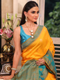 Mustard Banarsi Silk Blend Woven Design Zari Saree With Blouse Piece