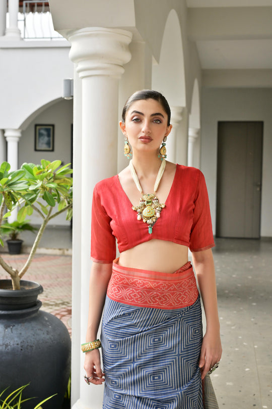 Grey & Red Soft Desi Tussar Silk Saree With Unique Ikkat Painted Pattern With Tradional Ikkat Pallu And Border With Traditional Tassels And Contrast Blouse Piece