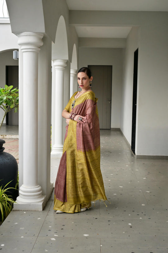 Yellow & Red Soft Desi Tussar Silk Saree With Unique Ikkat Painted Pattern With Tradional Ikkat Pallu And Border With Traditional Tassels And Contrast Blouse Piece