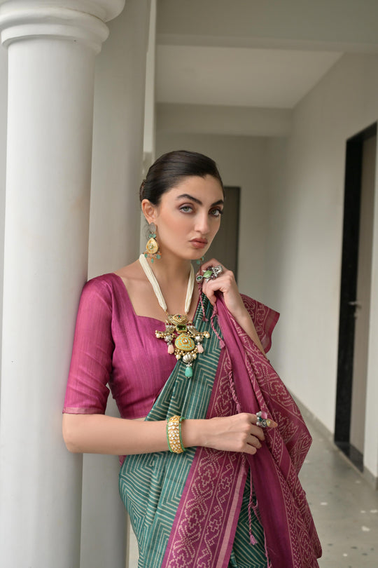 Green & Pink Soft Desi Tussar Silk Saree With Unique Ikkat Painted Pattern With Tradional Ikkat Pallu And Border With Traditional Tassels And Contrast Blouse Piece