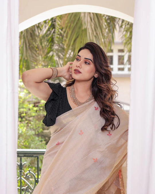 Chiku & Khakhi Premium Soft Muga Cotton Saree With Classic Colorful Resham Weaving Pallu And Traditional Zari Weaving Border And All Over Resham Weaving Butties And Fancy Tassels With Contrast Blouse Piece