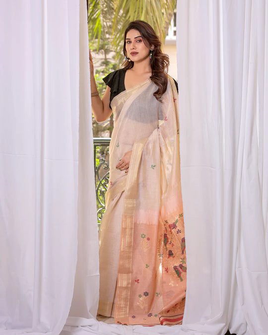 Off White & Peach Premium Soft Muga Cotton Saree With Classic Colorful Resham Weaving Pallu And Traditional Zari Weaving Border And All Over Resham Weaving Butties And Fancy Tassels With Contrast Blouse Piece