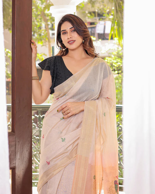 Off White & Peach Premium Soft Muga Cotton Saree With Classic Colorful Resham Weaving Pallu And Traditional Zari Weaving Border And All Over Resham Weaving Butties And Fancy Tassels With Contrast Blouse Piece