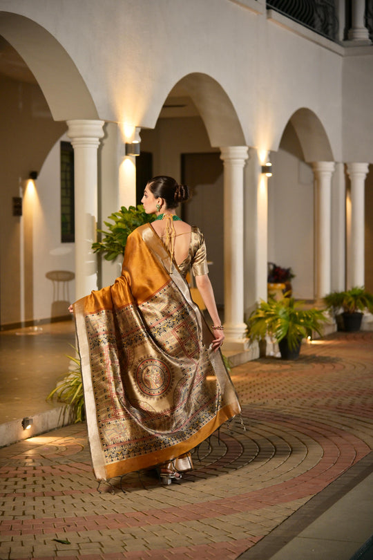 Mustard Soft Khadi Raw Silk Saree With Traditional Hand Painted Madhu Bani Pallu And Zari Weaving Temple Border With Extraordinary Lotus Printed Blouse Piece