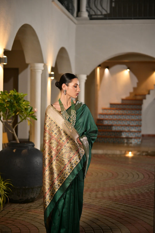 Dark Green Soft Khadi Raw Silk Saree With Traditional Hand Painted Madhu Bani Pallu And Zari Weaving Temple Border With Extraordinary Lotus Printed Blouse Piece