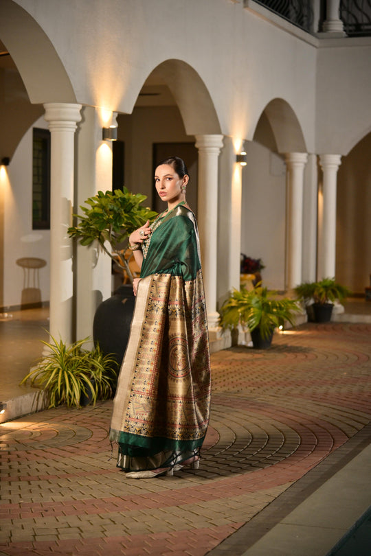 Dark Green Soft Khadi Raw Silk Saree With Traditional Hand Painted Madhu Bani Pallu And Zari Weaving Temple Border With Extraordinary Lotus Printed Blouse Piece