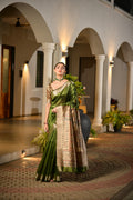 Green Soft Khadi Raw Silk Saree With Traditional Hand Painted Madhu Bani Pallu And Zari Weaving Temple Border With Extraordinary Lotus Printed Blouse Piece