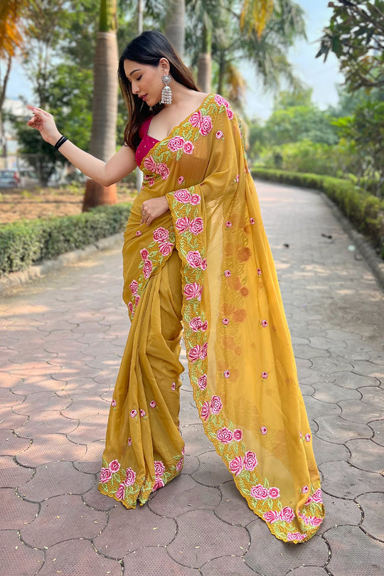 Yellow Georgette Saree with Pink Blouse Piece