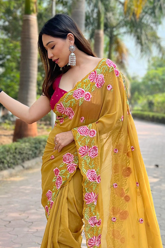 Yellow Georgette Saree with Pink Blouse Piece