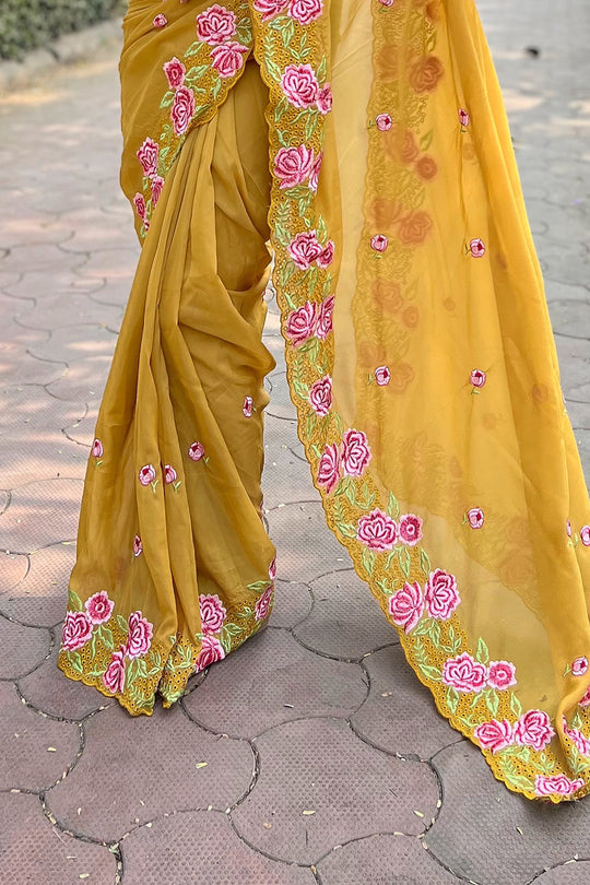 Yellow Georgette Saree with Pink Blouse Piece