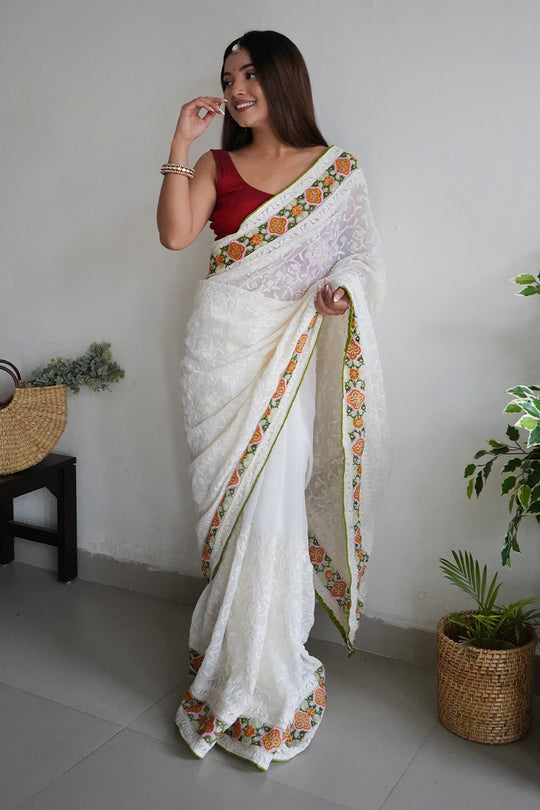 Off White Georgette Saree with Red Blouse Piece