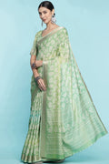 Pista Green Dola Silk Saree With Blouse Piece