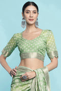 Pista Green Dola Silk Saree With Blouse Piece