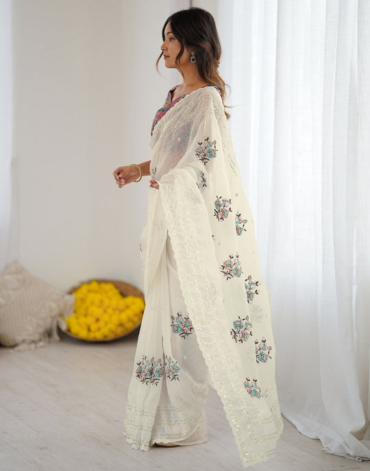 Premium  Crush Organza Sarees With Self Sequins Weaving Pattern All Over The Sarees With Dori Arco Border & Contrast Blouse