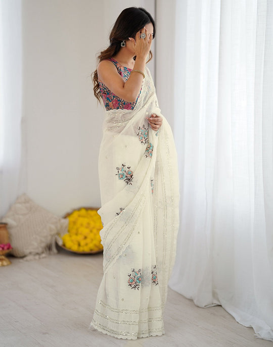 Premium  Crush Organza Sarees With Self Sequins Weaving Pattern All Over The Sarees With Dori Arco Border & Contrast Blouse