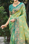 Light Pista Green Soft Silk Woven Work Traditional Saree