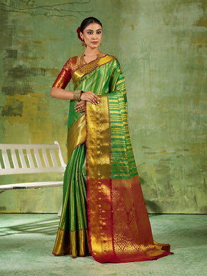 Green Silk Blend Saree With Blouse Piece