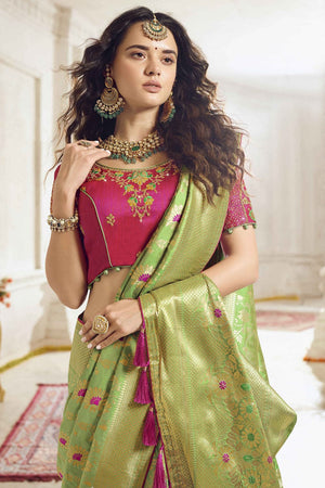 Pastel Green Woven Designer Banarasi Saree With Embroidered Silk Blouse
