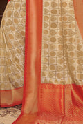 Beige red handcrafted customised kanjivaram Saree - Buy online on Karagiri - Free shipping to USA