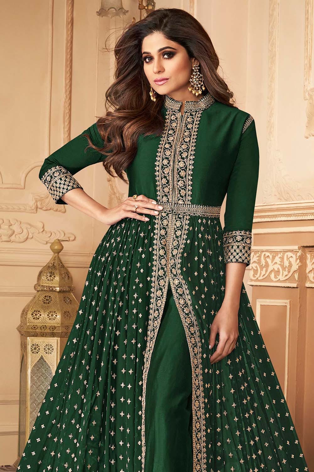 FERN GREEN ANARKALI GOWN SET WITH DORI THREAD WORK AND SILVER  EMBELLISHMENTS PAIRED WITH A MATCHING DUPATTA AND TASSELS. - Seasons India