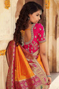 orange saree with pink border 