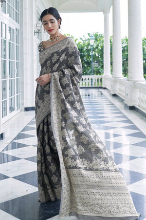 https://www.karagiri.com/cdn/shop/products/cotton-saree-fossil-black-cotton-saree-silk-saree-online-24457507274945_300x.jpg?v=1648524248