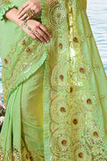 Pastel green designer embroidered saree with embroidered blouse - Wedding Wardrobe collection - Buy online on Karagiri - Free shipping to USA