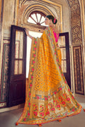 Turmeric yellow woven designer banarasi saree with embroidered silk blouse - Wedding sutra collection - Buy online on Karagiri - Free shipping to USA