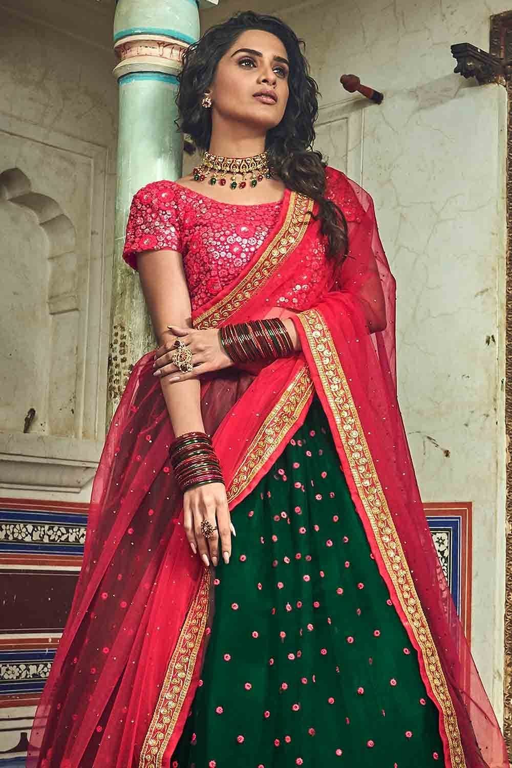 Trendy Peach and Dark Green Colored Designer Lehenga Choli