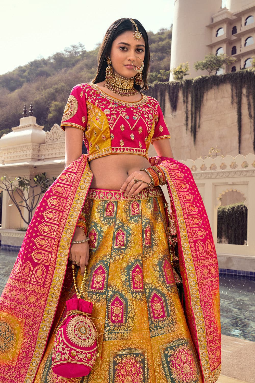 Photo of Pink and mustard yellow bridal lehenga by Anju Modi