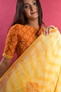 yellow leheriya saree