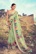 Buy Beautiful pastel green linen saree online - Karagiri