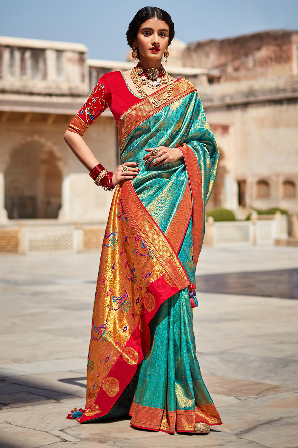 Wine Banarasi Silk Saree adorned with Beautiful Patola and Paithani Weaves  - Mirra Clothing